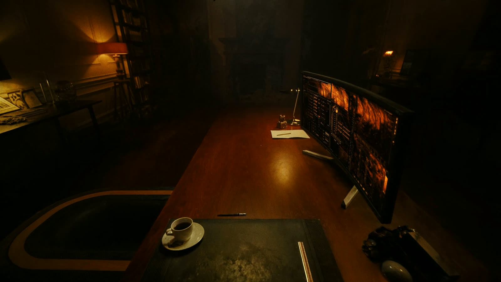 A studio desk at night, monitor glowing amber
